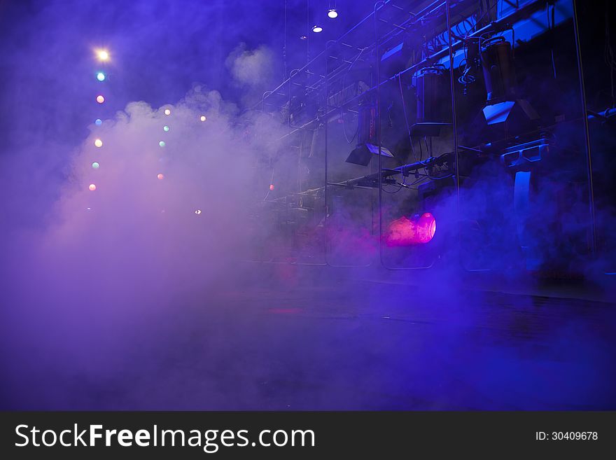 Stage lights on a console, smoke. Stage lights on a console, smoke