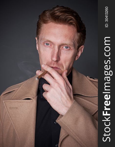 Elegant man with a cigar