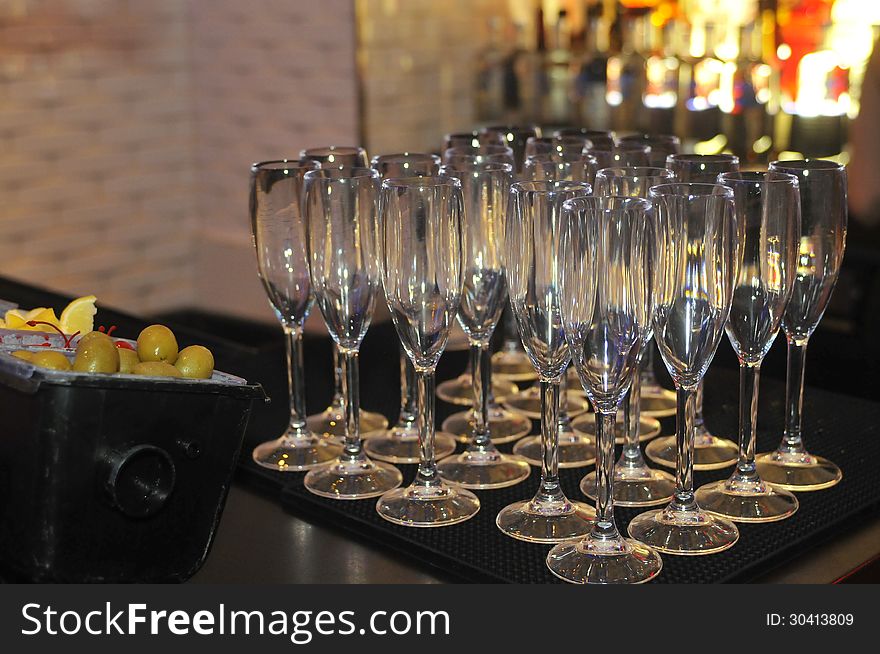 Champagne glasses on the bar