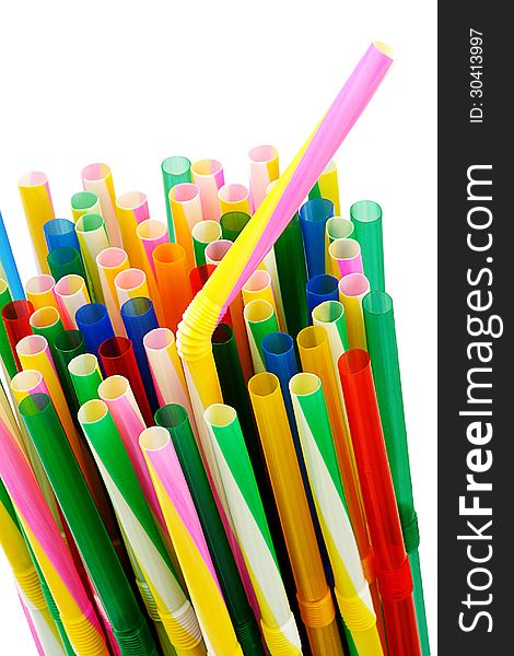 Image of a bunch of colorful plastic drinking straws on a white background. Image of a bunch of colorful plastic drinking straws on a white background.