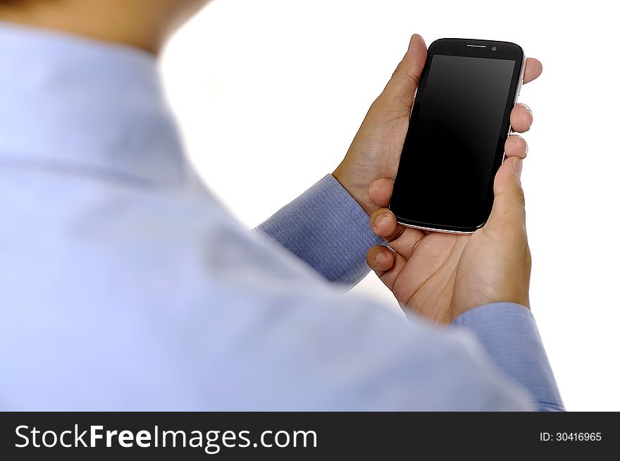 Business man holding smartphone isolated over white background