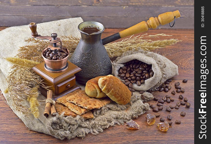 Composition with grinder, cookies and fresh coffee beans. Composition with grinder, cookies and fresh coffee beans