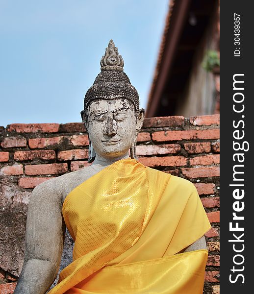 Stone statue of a Buddha in Ayutthaya, Thailand. Stone statue of a Buddha in Ayutthaya, Thailand.