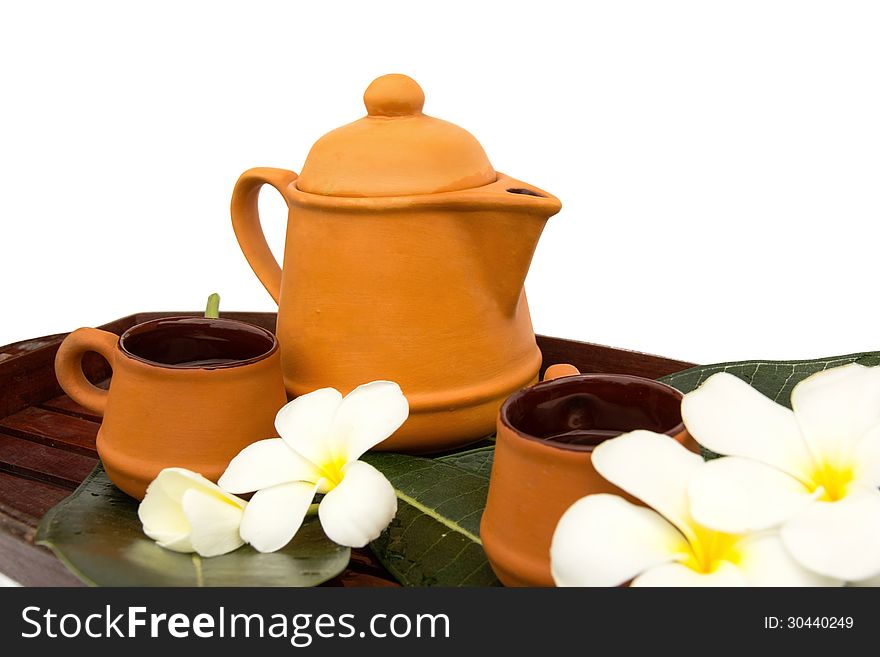 Asian tea set with flower.