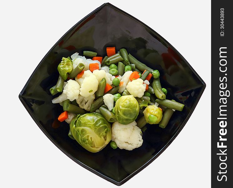 Mixed vegetables in a black plate