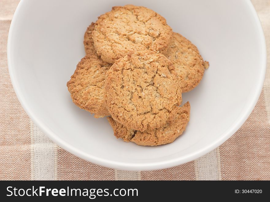 Home made chocolate chip cookies on a white plate. Home made chocolate chip cookies on a white plate.