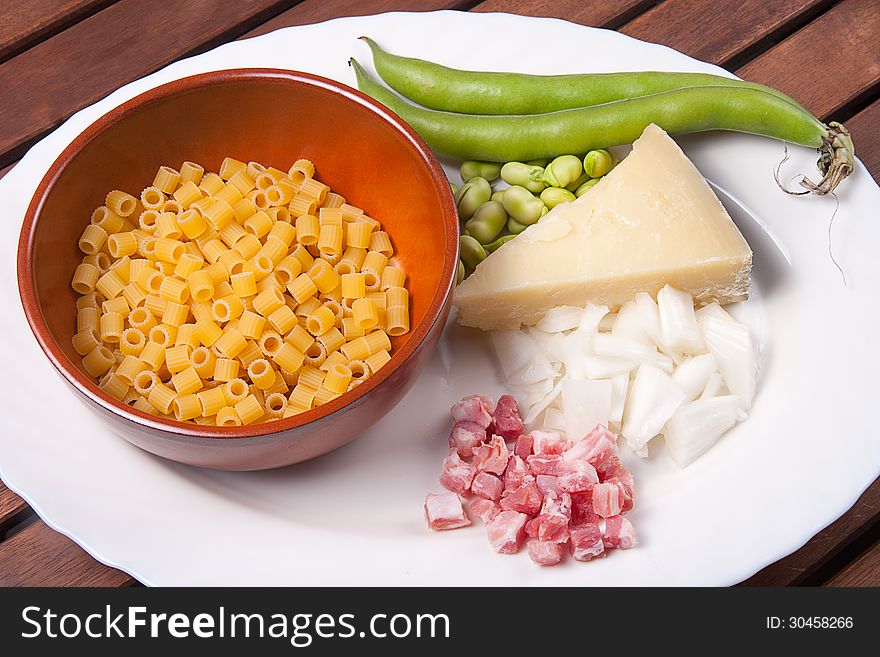 Traditional Italian dish of pasta beans sheep's cheese and bacon. Traditional Italian dish of pasta beans sheep's cheese and bacon