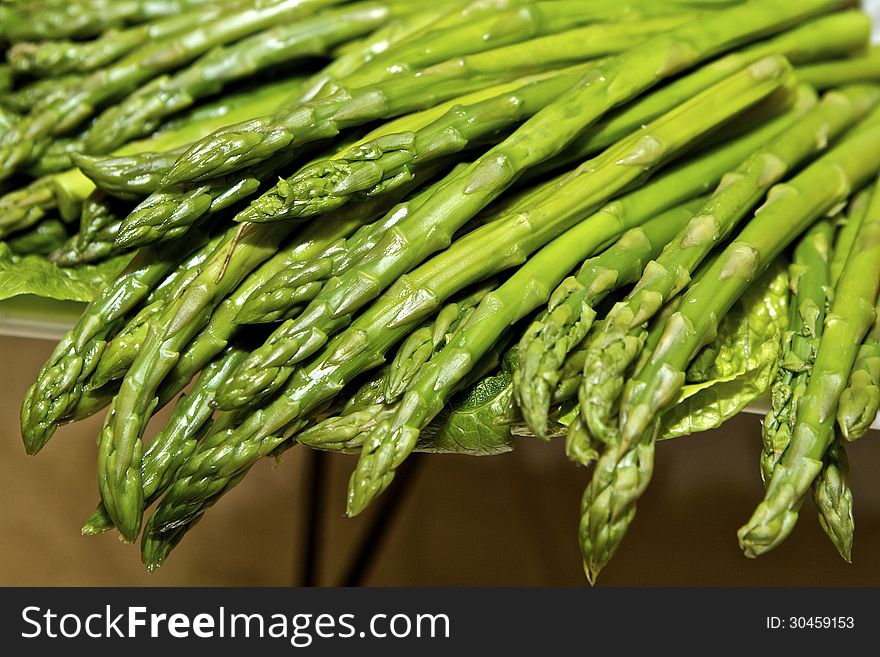 Closeup of piled, bright, green asparagus spears. Closeup of piled, bright, green asparagus spears.