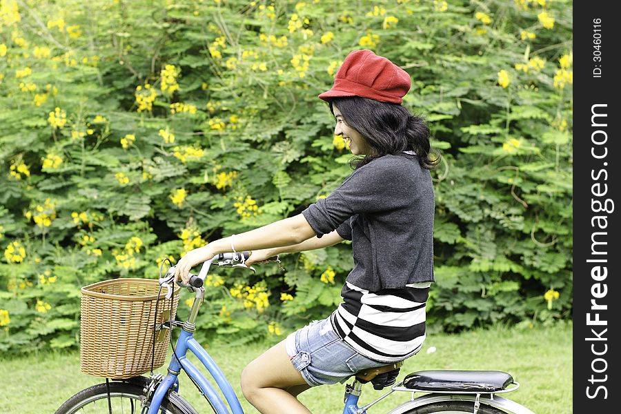 Young woman cycling and having fun