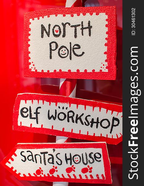 North Pole, Elf's Workshop and Santa's House signboards. North Pole, Elf's Workshop and Santa's House signboards