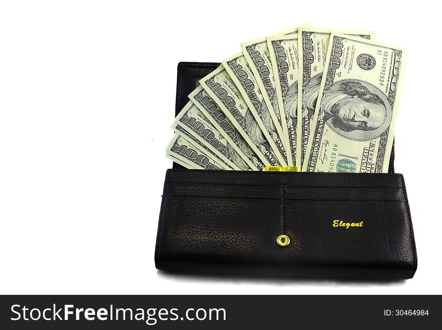 Black wallet with dollar bills in a hundred dollars on a white background. Black wallet with dollar bills in a hundred dollars on a white background