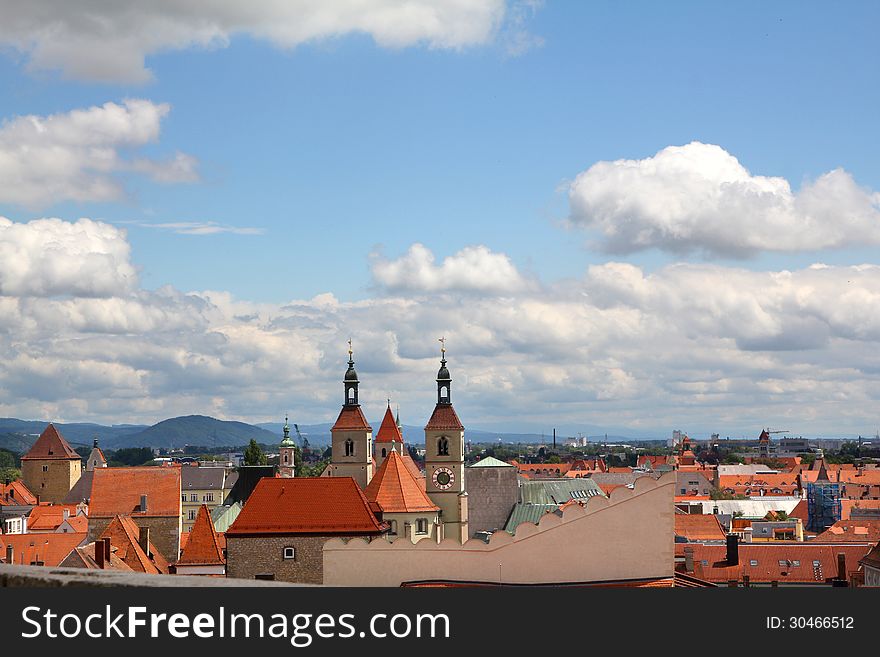 Old european town roofs under blue sky. Old european town roofs under blue sky