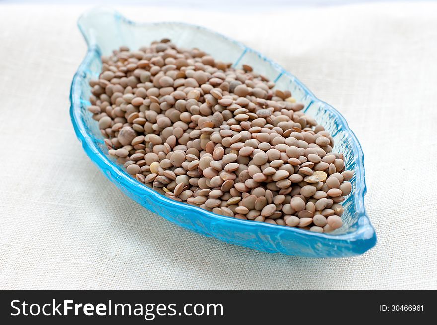 Brown Lentils In A Leaf-shaped Plate