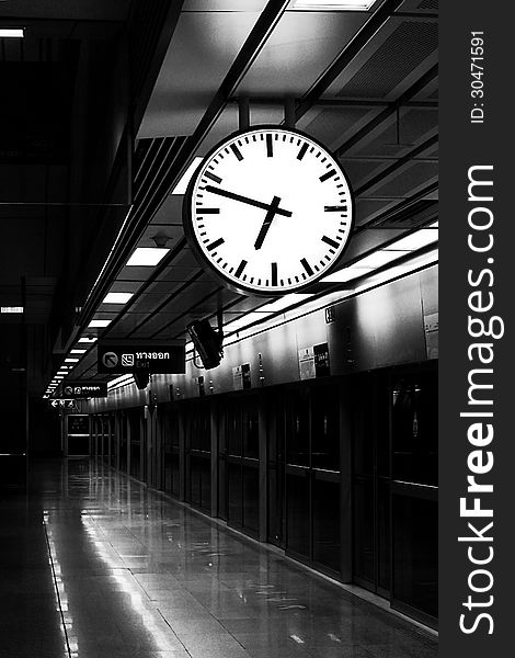 Black&white Picture of clock in train station. Time is a competition , Every minute is precious. Black&white Picture of clock in train station. Time is a competition , Every minute is precious.