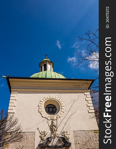 The Church of St. Adalbert on the Main Market Square in Old Town, Krakow, Poland. One of the oldest stone churches in Poland, built in Romanesque architectural style in the early Middle Ages.