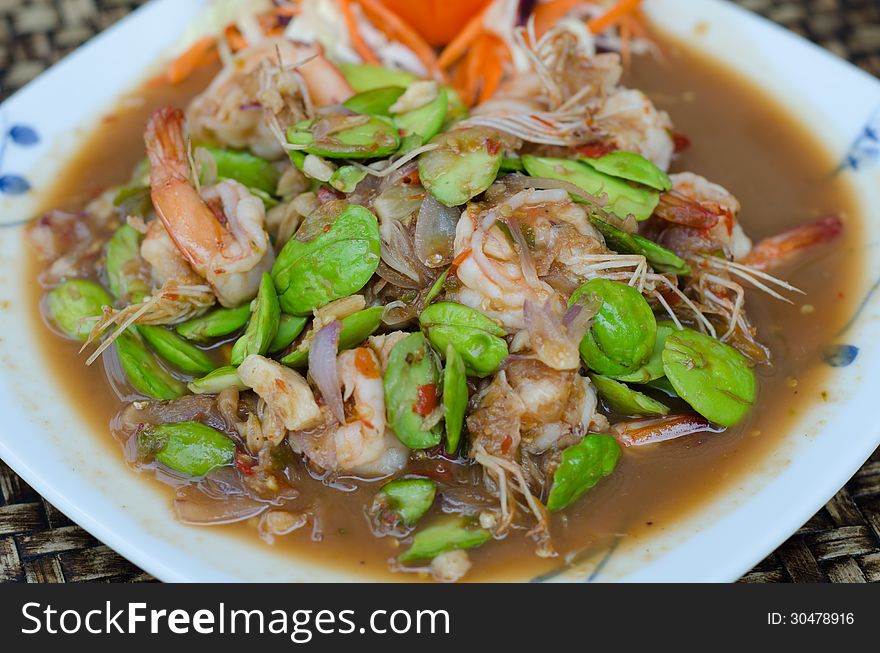 Thai food name Fried Parkia with shrimp and source.