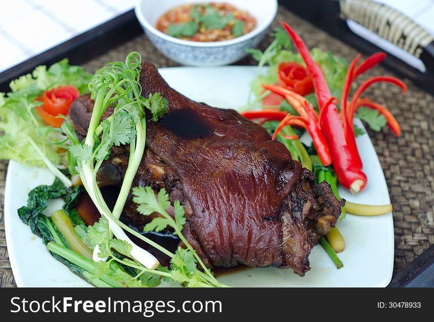 Thai food name Steam pork leg with gravy and vegetable
