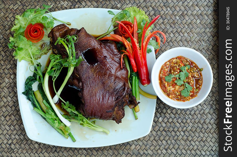 Thai food name Steam pork leg with gravy and vegetable