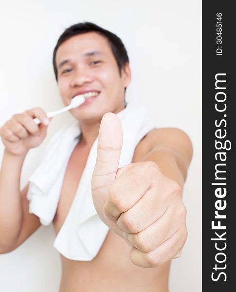 Man Brushing His Teeth