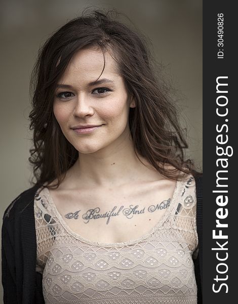 Portrait of Beautiful Young Woman with Brown Hair