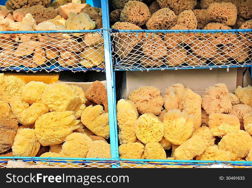 Natural sponge in different shapes on boat stall in Greece