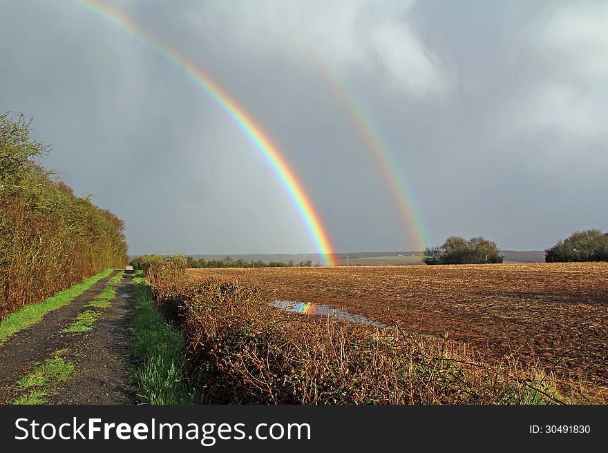 Double Rainbow Over Meadow