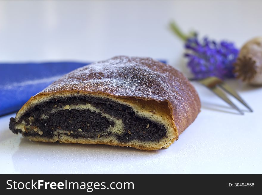 Cake with poppy seeds on the table. Cake with poppy seeds on the table