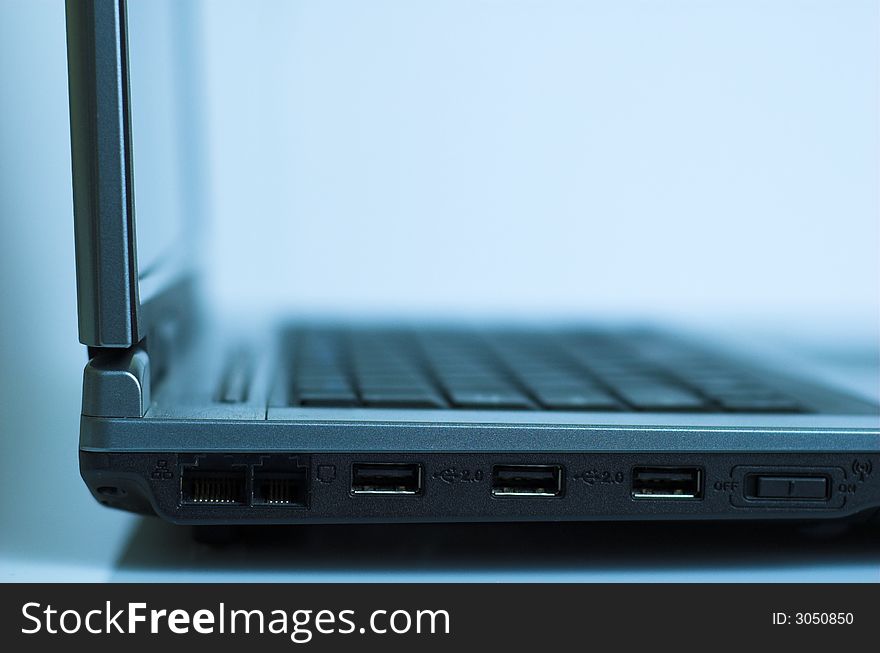 Side view of a laptop - shallow depth of field. Side view of a laptop - shallow depth of field