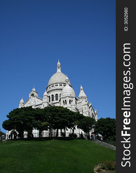 Sacre Coeur in Montmartre on a beautiful summer day in Paris, France