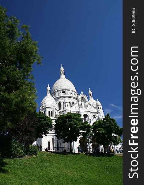 Sacre Coeur in Montmartre on a beautiful summer day in Paris, France