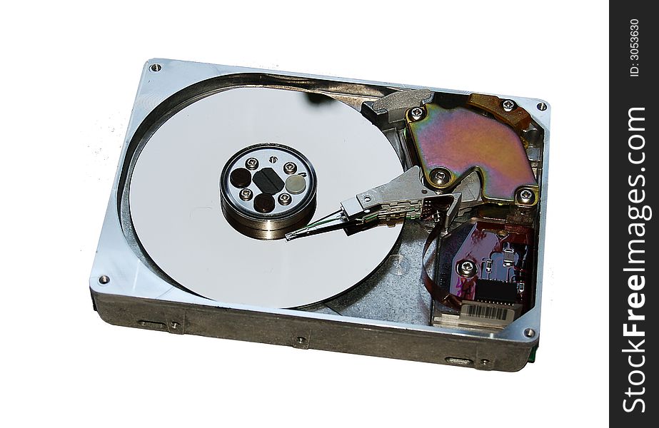 Old opened hard drive on the white background. Old opened hard drive on the white background