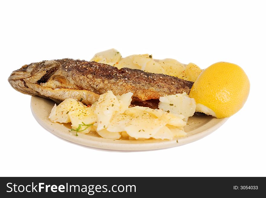 Fish Lunch. Trout, potato salad and lemon.