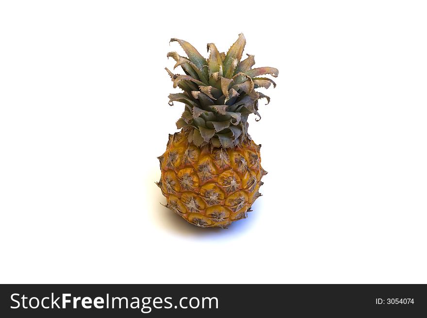 Fresh mini pineapple isolated on white background