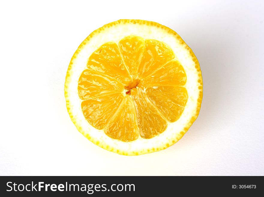 Half a lemon isolated on white background