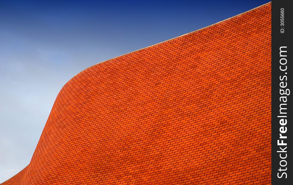 Detail of a Bricked Wall in a beautiful background blue sky