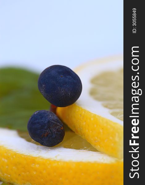 Close up of the two grapes on the lemon