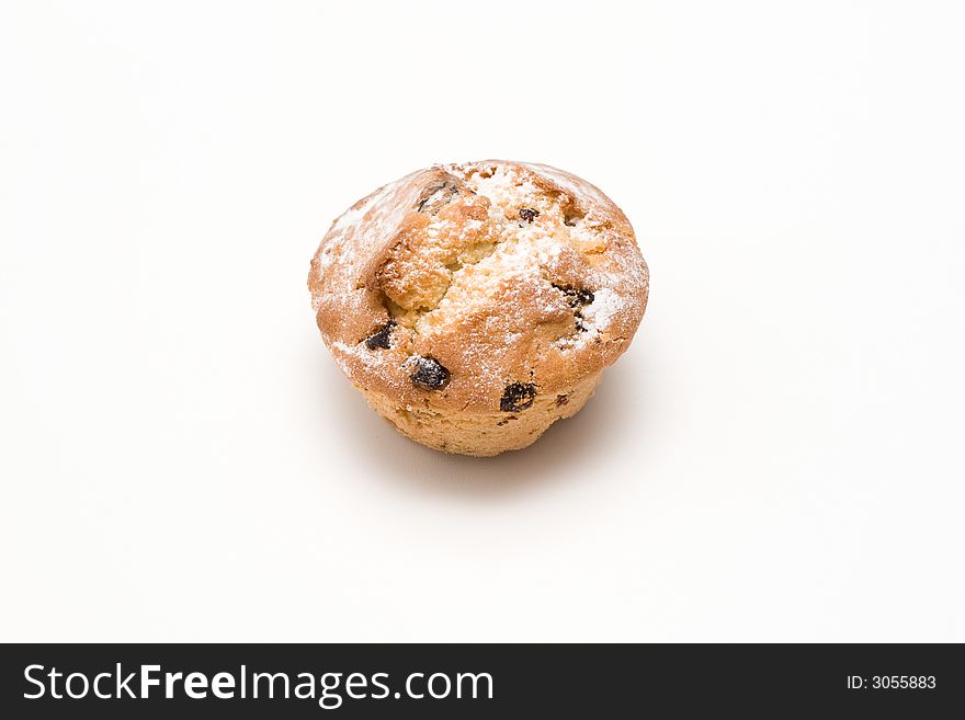 Cake with raisins isolated on white