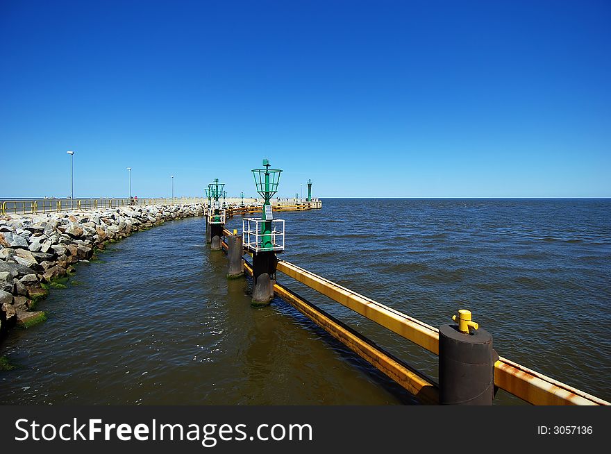 Colorful sea port with blue water and sky