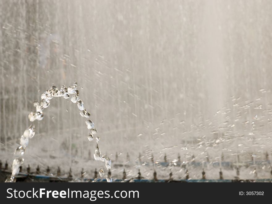 A stream of water in the fountain