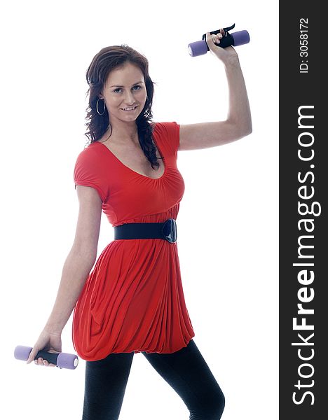 Pretty girl in red top working out with dumbbell. Pretty girl in red top working out with dumbbell