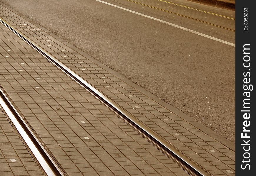 Train rails in center city Zagreb, sepia color