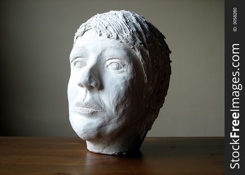 Woman head sculptured from plaster and love. Woman head sculptured from plaster and love