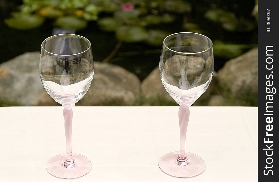 Pair of Wine Glasses on a White Table Cloth