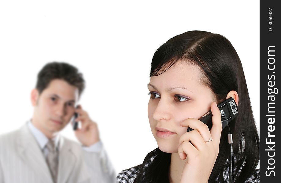 The young woman calls by phone to the man. The young woman calls by phone to the man