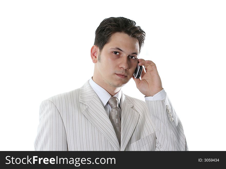The young businessman speaks by phone
