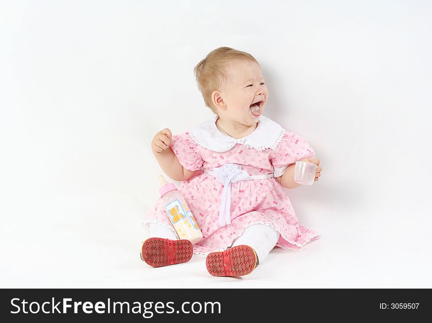 Portrait of the beautiful cheerful baby . Portrait of the beautiful cheerful baby