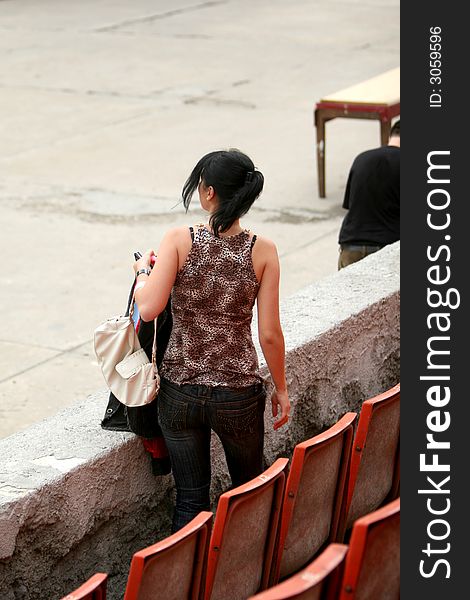 A nice girl alone in the stadium