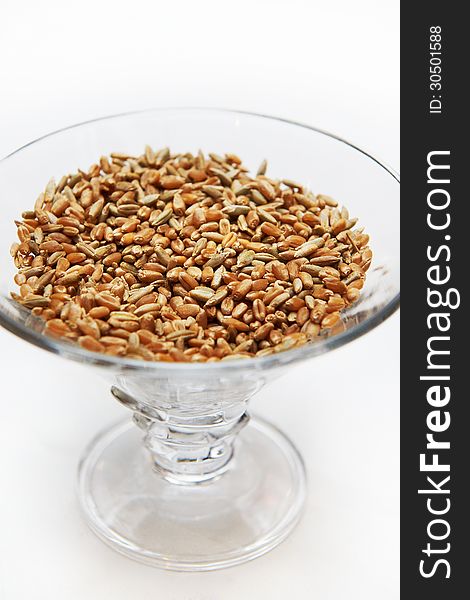 Wheat grain in a glass bowl