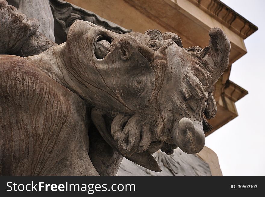 Baroque sculpture in Salzburg, Austria. Mythological figure detail: the devil. Baroque sculpture in Salzburg, Austria. Mythological figure detail: the devil.