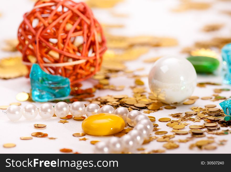 Variety celebratory tinsel on light surface